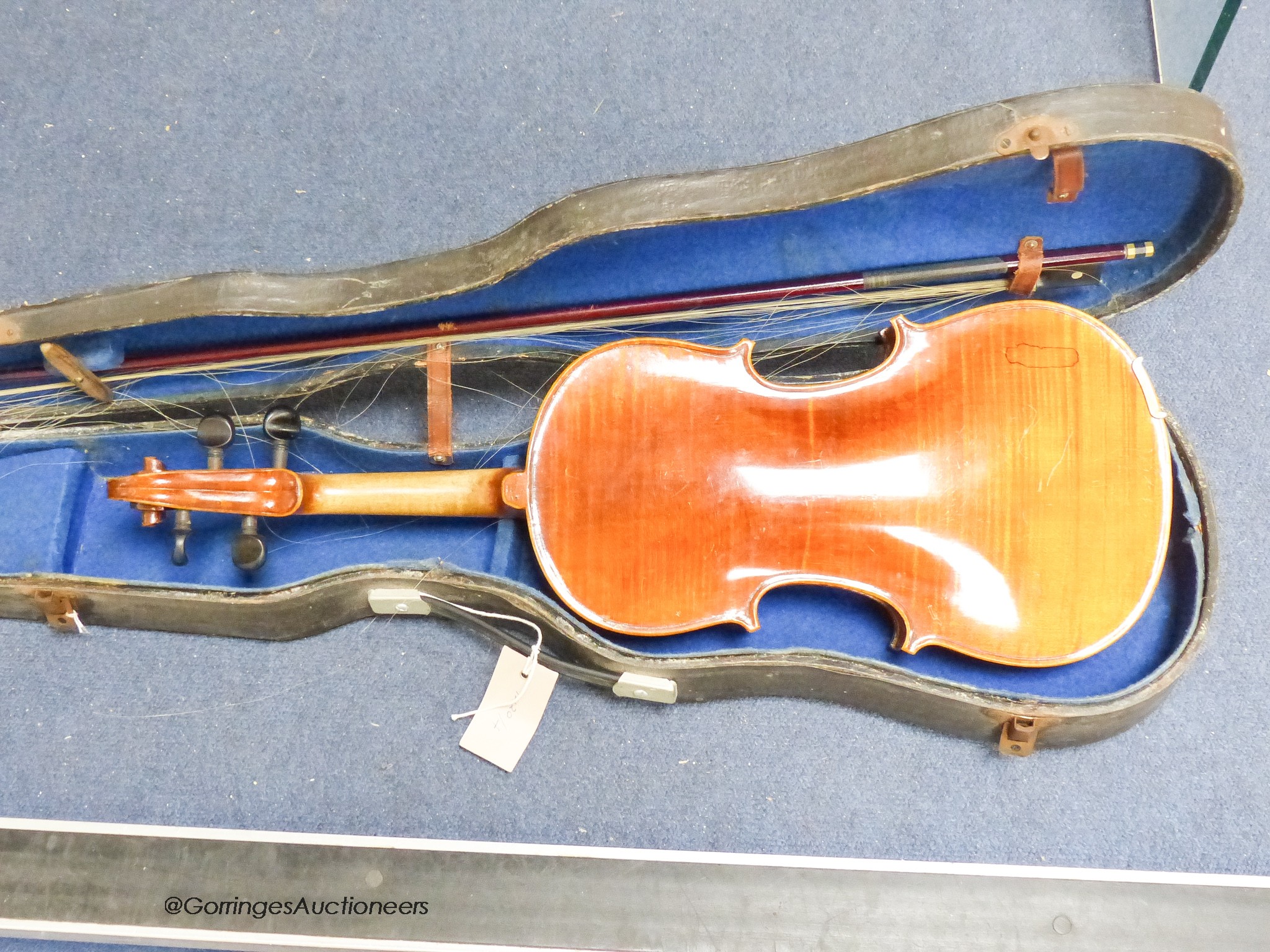 A student violin in case